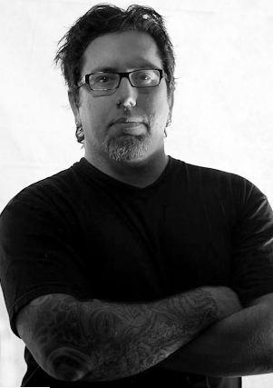 Portrait of Chris Nicholas.